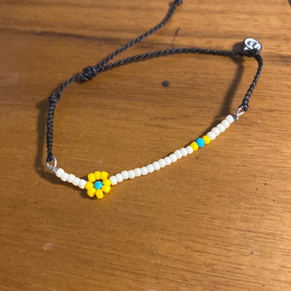 Black Beaded puravida bracelet with flower